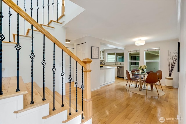 202 W Olympic Pl Unit 201, Seattle, WA 98119 - stairway featuring wood finished floors