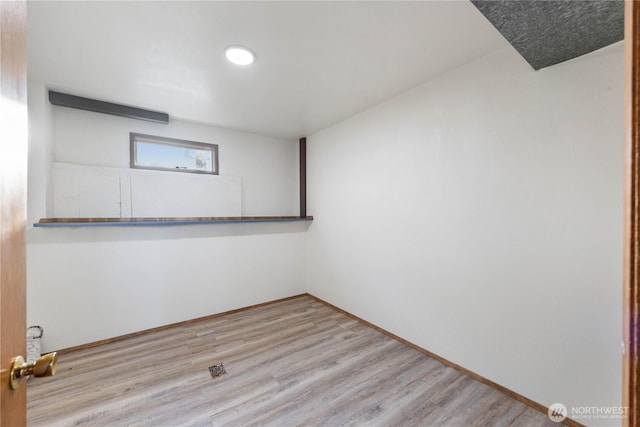 2104 E Ave, Anacortes, WA 98221 - unfurnished room with wood finished floors and recessed lighting