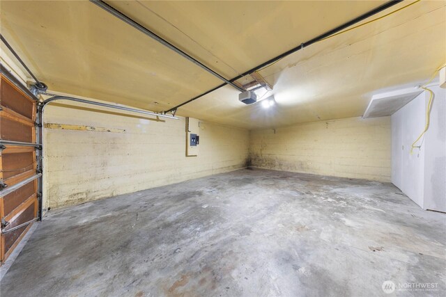 2104 E Ave, Anacortes, WA 98221 - garage with a garage door opener and electric panel