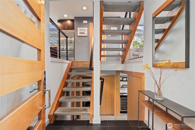 1115 24th Ave S, Seattle, WA 98144 - staircase featuring tile patterned floors and recessed lighting