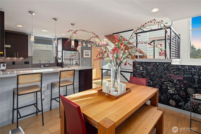 1115 24th Ave S, Seattle, WA 98144 - dining area featuring light wood-type flooring and recessed lighting