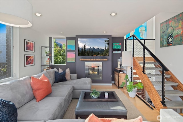 1115 24th Ave S, Seattle, WA 98144 - living room featuring recessed lighting, wood finished floors, stairs, and healthy amount of natural light