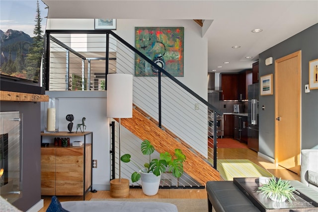 1115 24th Ave S, Seattle, WA 98144 - staircase with wood finished floors and recessed lighting
