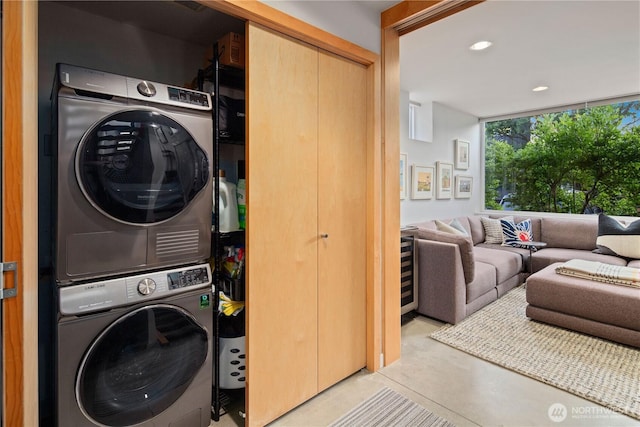 1115 24th Ave S, Seattle, WA 98144 - laundry room featuring stacked washer / drying machine, recessed lighting, and beverage cooler