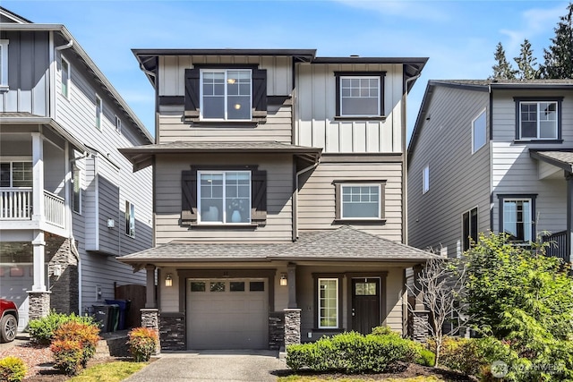 31 157th Ln SE, Bothell, WA 98012 - craftsman inspired home featuring board and batten siding, an attached garage, driveway, and a shingled roof