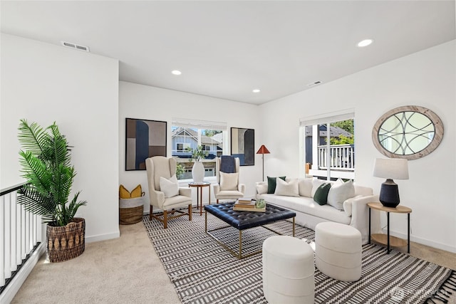 31 157th Ln SE, Bothell, WA 98012 - living room featuring plenty of natural light, light carpet, and recessed lighting