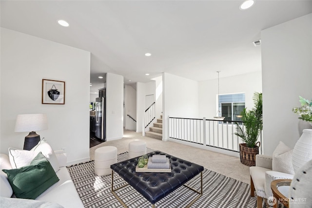 31 157th Ln SE, Bothell, WA 98012 - living room featuring light colored carpet, recessed lighting, and stairway
