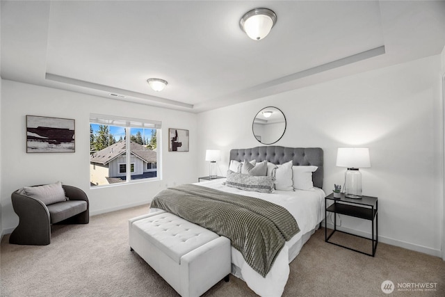 31 157th Ln SE, Bothell, WA 98012 - carpeted bedroom featuring a raised ceiling and baseboards