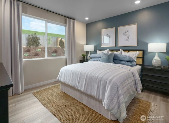 18527 135th Ave E Unit 127, Puyallup, WA 98374 - bedroom featuring light wood-style floors and recessed lighting