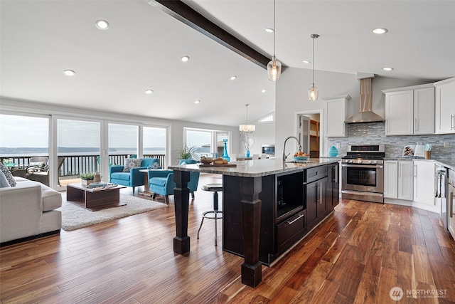 5530 Frances Ave NE, Tacoma, WA 98422 - kitchen with gas stove, wall chimney exhaust hood, open floor plan, light stone counters, and dark wood-style flooring