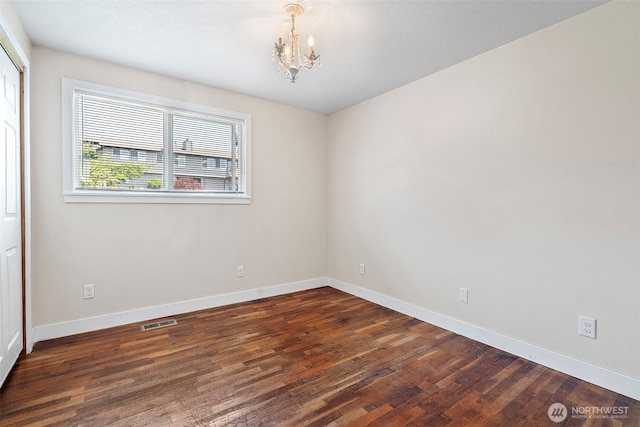 5530 Frances Ave NE, Tacoma, WA 98422 - empty room with a chandelier and wood finished floors