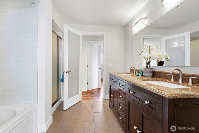 5530 Frances Ave NE, Tacoma, WA 98422 - full bath featuring double vanity, a shower stall, and a bath