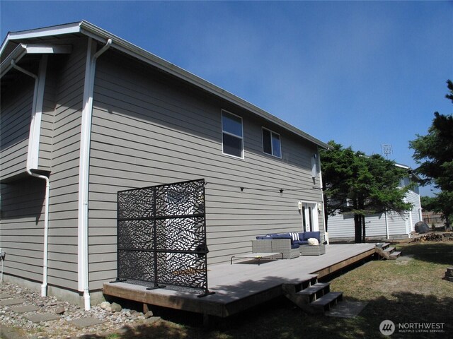 32404 G St, Ocean Park, WA 98640 - back of property with a wooden deck and an outdoor living space