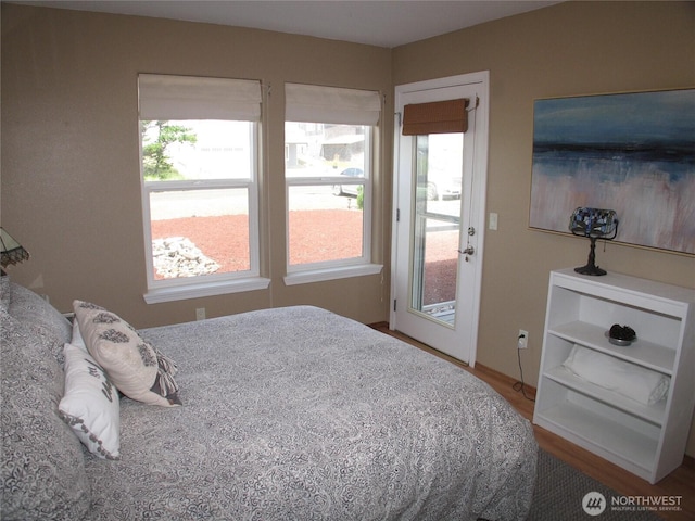 32404 G St, Ocean Park, WA 98640 - bedroom featuring access to outside, multiple windows, and wood finished floors