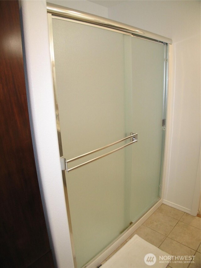 32404 G St, Ocean Park, WA 98640 - full bath with a shower stall and tile patterned flooring