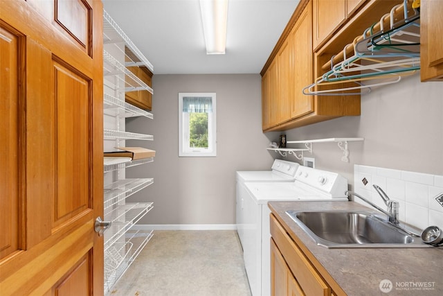93 Old Schoolhouse Rd, Sequim, WA 98382 - laundry area featuring washer and clothes dryer and cabinet space