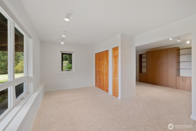 93 Old Schoolhouse Rd, Sequim, WA 98382 - empty room featuring track lighting and carpet flooring