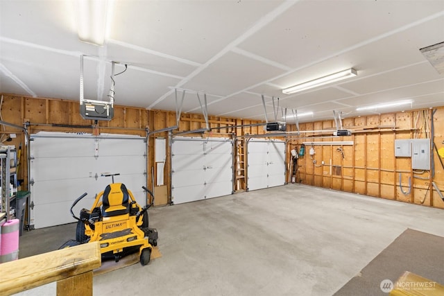 93 Old Schoolhouse Rd, Sequim, WA 98382 - garage with a garage door opener and electric panel
