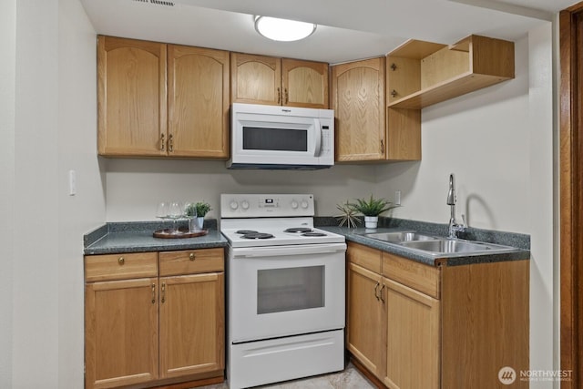 21240 15th Ave S, Des Moines, WA 98198 - kitchen with white appliances and dark countertops