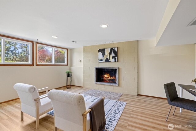 21240 15th Ave S, Des Moines, WA 98198 - living area featuring a large fireplace, light wood-style floors, and recessed lighting