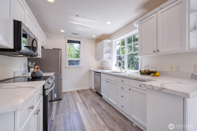 4121 248th Ct SE Unit 45, Sammamish, WA 98029 - kitchen featuring stainless steel appliances, open shelves, white cabinetry, and recessed lighting