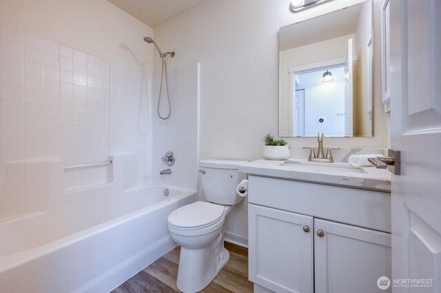 4121 248th Ct SE Unit 45, Sammamish, WA 98029 - bathroom featuring vanity, bathing tub / shower combination, and wood finished floors