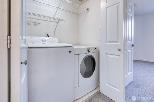 4121 248th Ct SE Unit 45, Sammamish, WA 98029 - laundry area featuring washing machine and dryer and light colored carpet