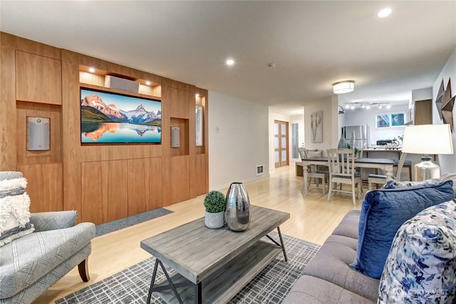 15732 NE 70th Ct, Redmond, WA 98052 - living area with wood finished floors and recessed lighting