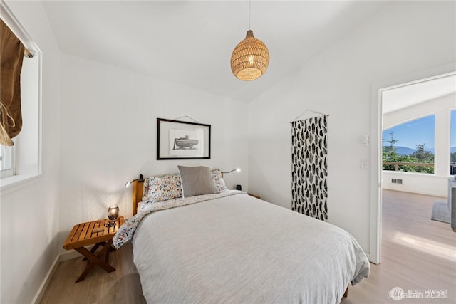 7773 Hideaway Ln, Anacortes, WA 98221 - bedroom with light wood finished floors and baseboards