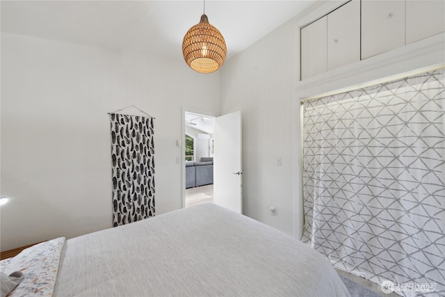 7773 Hideaway Ln, Anacortes, WA 98221 - bedroom featuring a chandelier