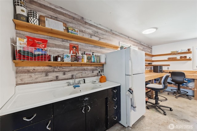 7773 Hideaway Ln, Anacortes, WA 98221 - bar area featuring freestanding refrigerator and unfinished concrete flooring