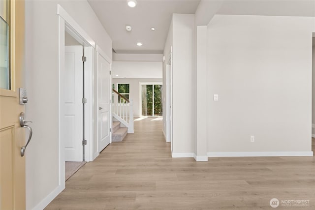 4043 98th Avenue Ct E Unit 24, Edgewood, WA 98371 - corridor featuring recessed lighting, stairway, and light wood-style flooring