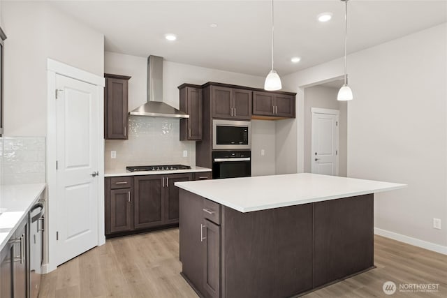 4043 98th Avenue Ct E Unit 24, Edgewood, WA 98371 - kitchen with wall chimney exhaust hood, black oven, built in microwave, light wood finished floors, and dark brown cabinetry