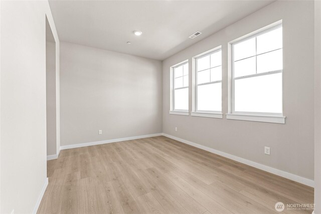 4043 98th Avenue Ct E Unit 24, Edgewood, WA 98371 - spare room with light wood-type flooring and baseboards