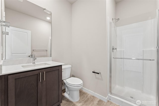 4043 98th Avenue Ct E Unit 24, Edgewood, WA 98371 - full bathroom featuring vanity, a shower stall, and wood finished floors