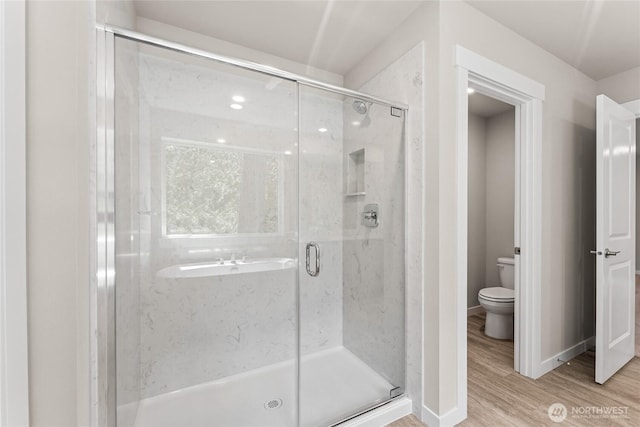4043 98th Avenue Ct E Unit 24, Edgewood, WA 98371 - bathroom featuring wood finished floors and a stall shower