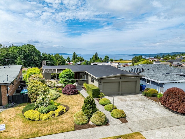 8751 Jones Ave NW, Seattle, WA 98117 - view of front of home with an attached garage and driveway