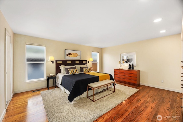 8751 Jones Ave NW, Seattle, WA 98117 - bedroom featuring wood finished floors and recessed lighting