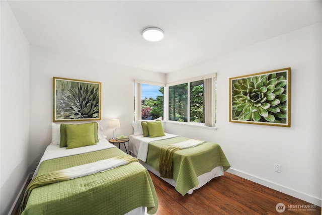8751 Jones Ave NW, Seattle, WA 98117 - bedroom featuring baseboards and wood finished floors