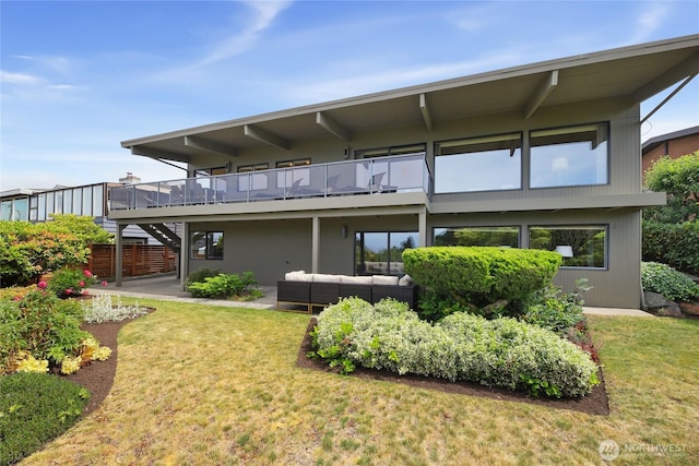 8751 Jones Ave NW, Seattle, WA 98117 - back of house with an outdoor living space, stairway, a lawn, and a deck