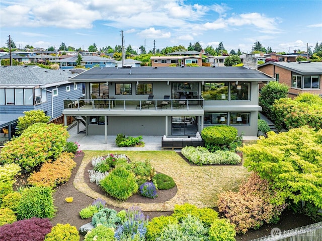 8751 Jones Ave NW, Seattle, WA 98117 - back of house featuring a patio area and a residential view