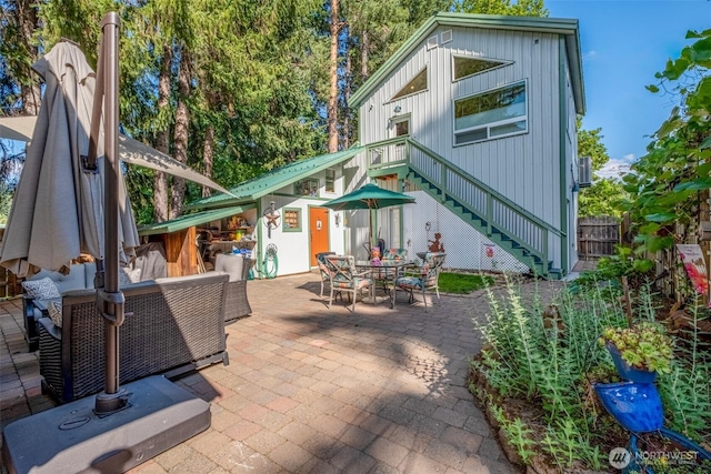 231 Benton, Leavenworth, WA 98826 - view of patio / terrace featuring stairs, outdoor dining space, and an outdoor living space