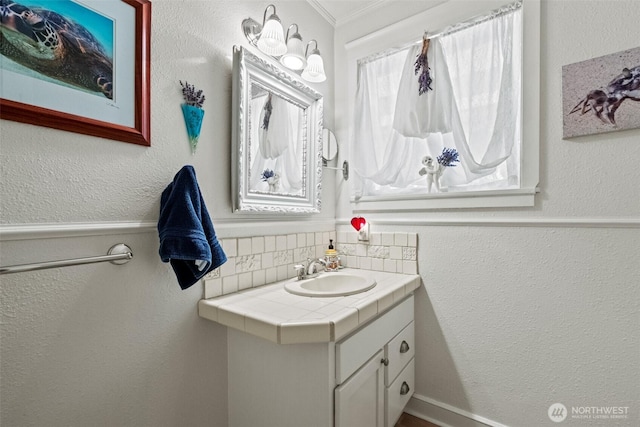 231 Benton, Leavenworth, WA 98826 - bathroom featuring vanity and ornamental molding
