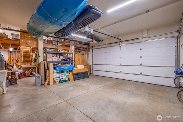 231 Benton, Leavenworth, WA 98826 - garage featuring a garage door opener