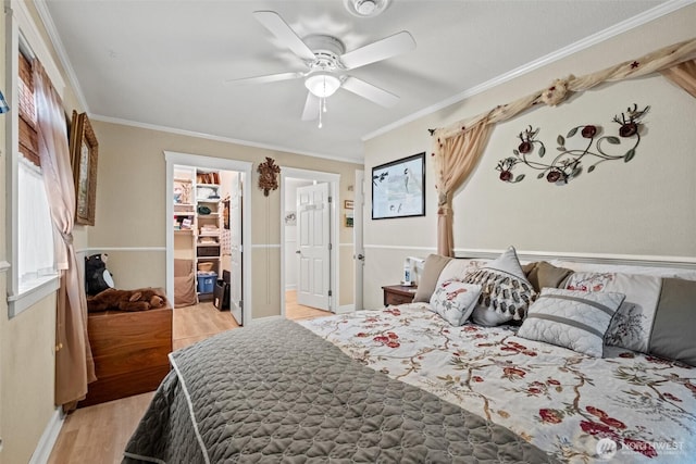 231 Benton, Leavenworth, WA 98826 - bedroom with light wood-style floors, ornamental molding, and ceiling fan
