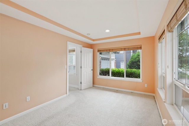 3301 Monterey Ct NE, Renton, WA 98056 - spare room featuring carpet floors, a raised ceiling, and recessed lighting