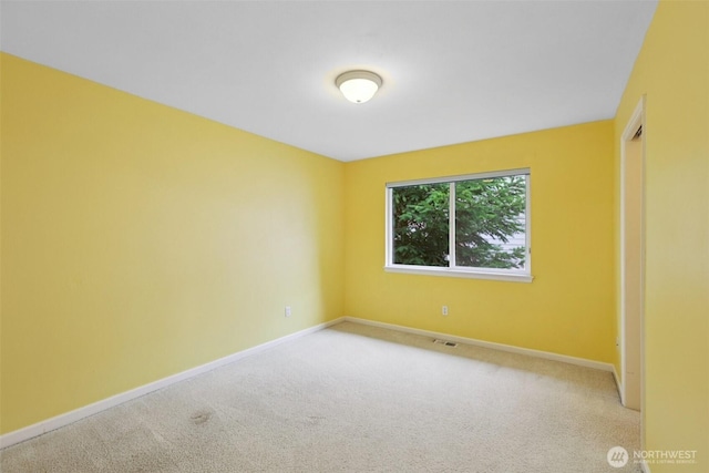 3301 Monterey Ct NE, Renton, WA 98056 - carpeted spare room featuring baseboards