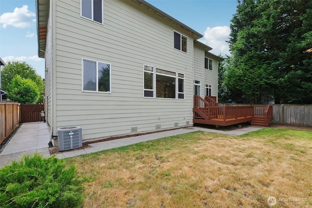 3301 Monterey Ct NE, Renton, WA 98056 - rear view of property with a fenced backyard, a deck, and crawl space