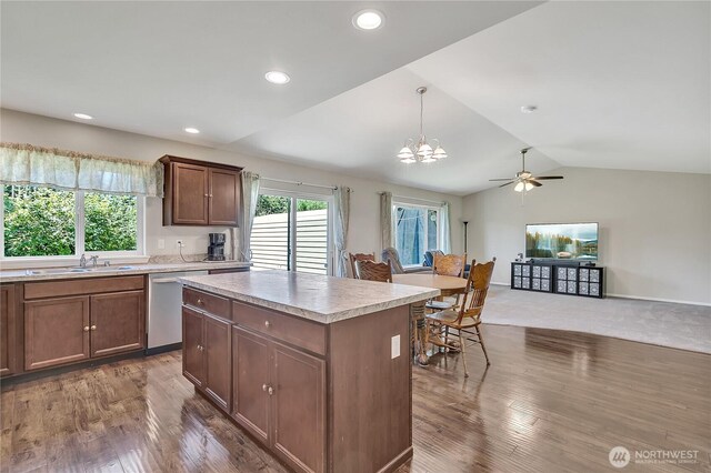 19802 69th Avenue Ct E, Spanaway, WA 98387 - kitchen with dishwasher, lofted ceiling, light countertops, a center island, and a chandelier