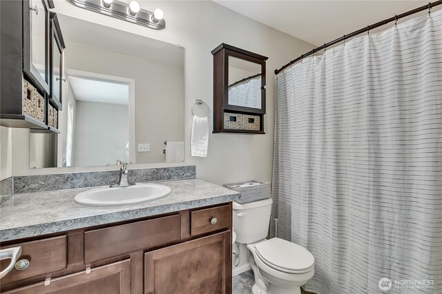 19802 69th Avenue Ct E, Spanaway, WA 98387 - bathroom featuring vanity and a shower with curtain